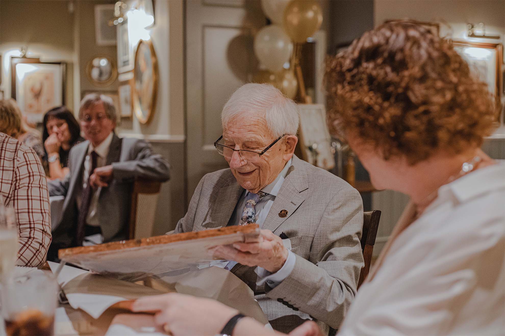 older man at a table